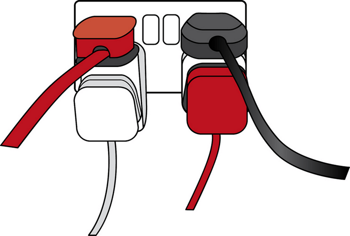 Two multi-plug holders are plugged into two different plug outlet sockets. Each multi-plug holder has a plug slot on it's top and to it's front side. Two plugs are plugged into each multi-plug holder.